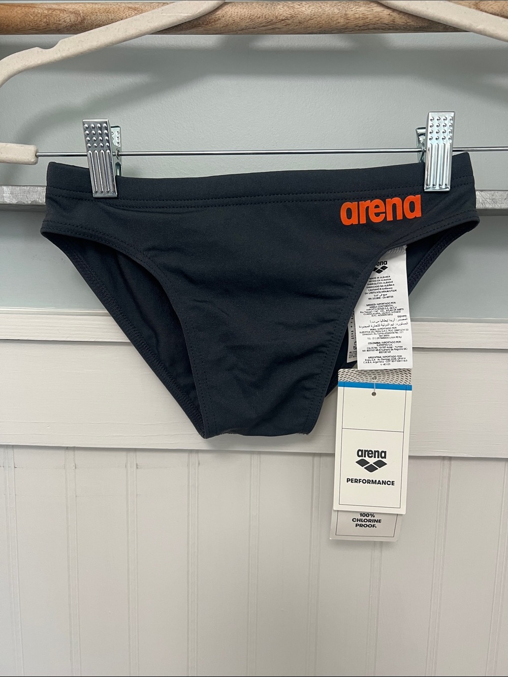 NWT Boys Arena team, solid, swim, brief performance size 24